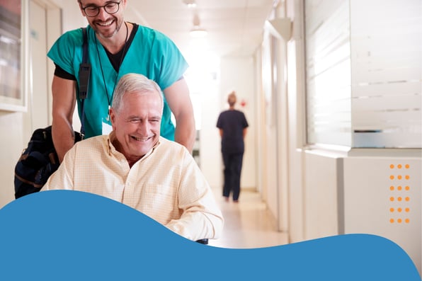 Long-term post-acute care physician assisting senior patient in skilled nursing facility hallway