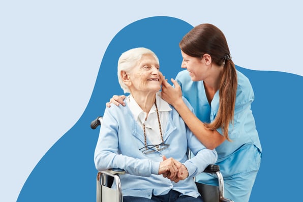 Caregiver providing compassionate support to an elderly patient in a wheelchair, representing quality long-term and post-acute care (LTPAC).